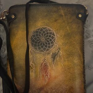Boho Leather crossbody with Dreamcatcher on it